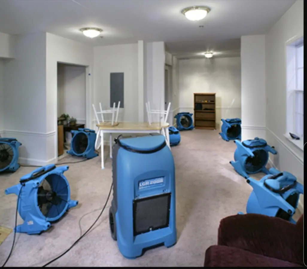 Air movers and dehumidifier setup for Water Damage Restoration in Pecan Plantation